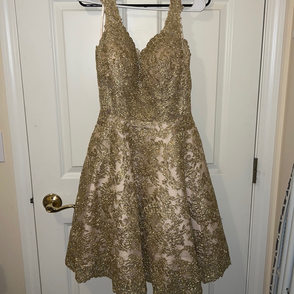 A Large, Gold Coya Collection short Dress